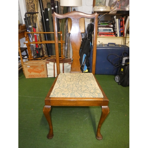 330 - A set of four upholstered dining room chairs.