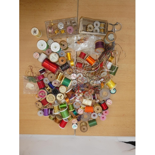 343 - A large lot of tinsel spools thread and more.