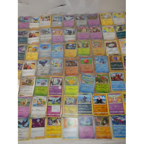 349 - A large lot of Pokemon trading cards.