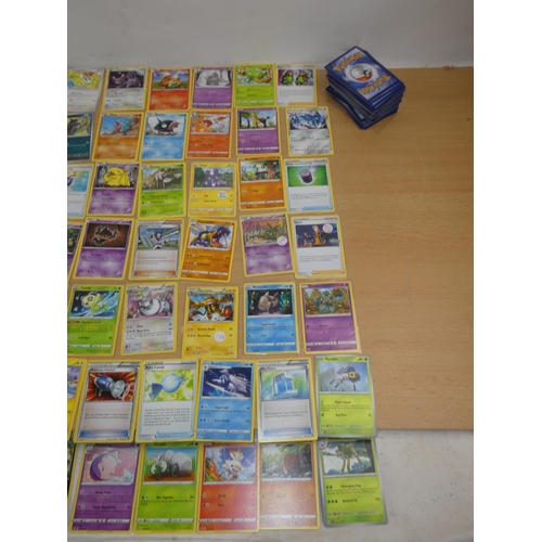 349 - A large lot of Pokemon trading cards.