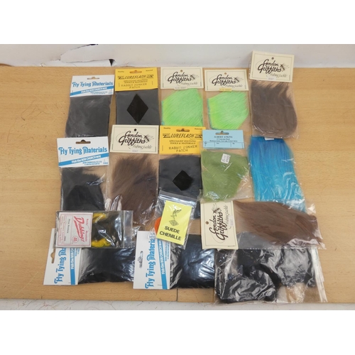 380 - A lot of new packs of fly tying material.