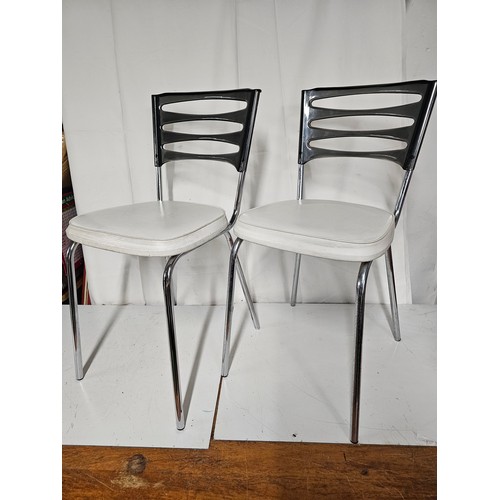 12 - A pair of vintage/ Mid Century dining chairs by Keron - London.