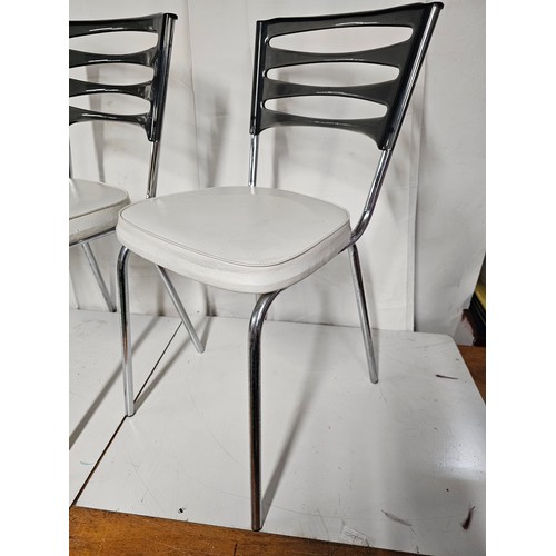 12 - A pair of vintage/ Mid Century dining chairs by Keron - London.