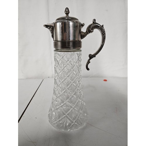 23 - A large antique style wine carafe.