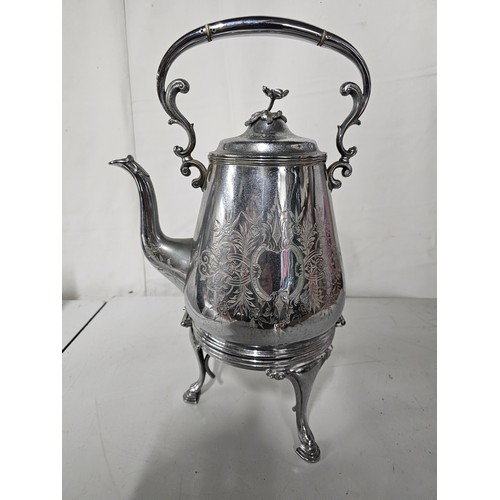 114 - An antique silver plated spirit kettle.