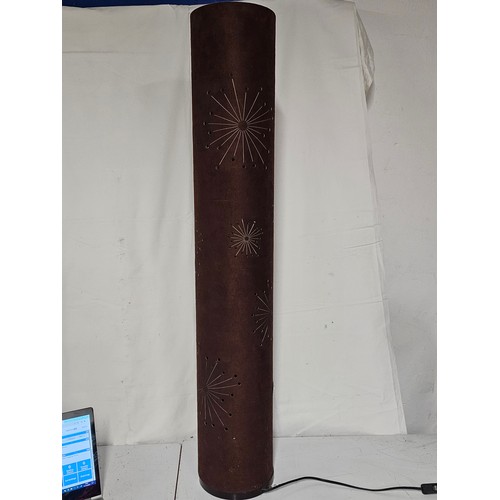 146 - A large freestanding floor lamp with decorative shade, measuring 116cm tall.