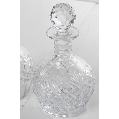 176 - Two crystal glass decanter.