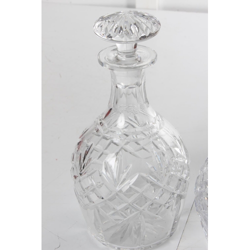 176 - Two crystal glass decanter.