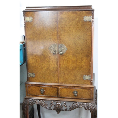 182 - *WITHDRAWN* A stunning antique style cocktail cabinet, by G&F, on cabriole legs, with decorative bra... 