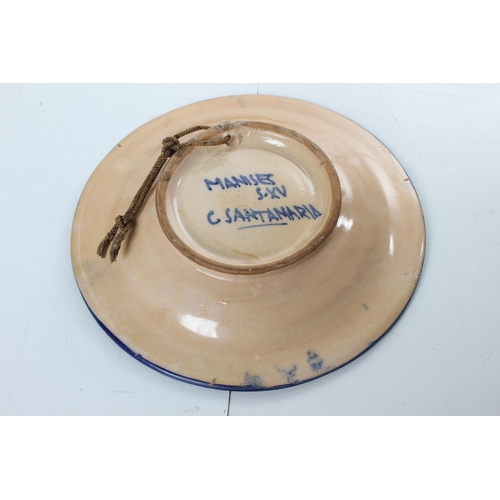 188 - A decorative hand painted bowl, signed to rear, 'Manises S.XV C Santamaria'.