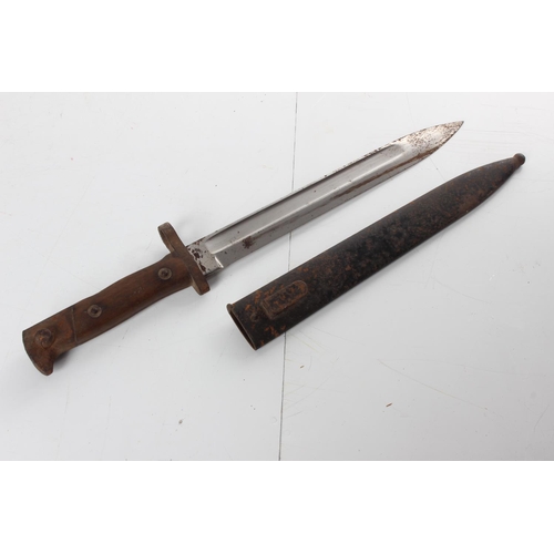 199 - An antique Bayonet in Scabbard, blade measuring