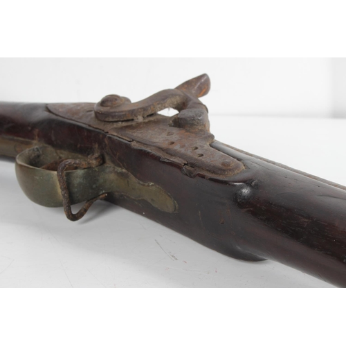 202 - An antique 'Brown Bess' rifle with original bayonet.