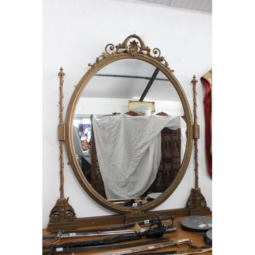 207 - A stunning antique/ Georgian gilt framed oval over mantle mirror, with twin pillars & ornate carving... 