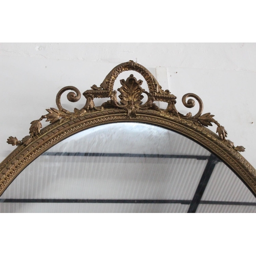 207 - A stunning antique/ Georgian gilt framed oval over mantle mirror, with twin pillars & ornate carving... 