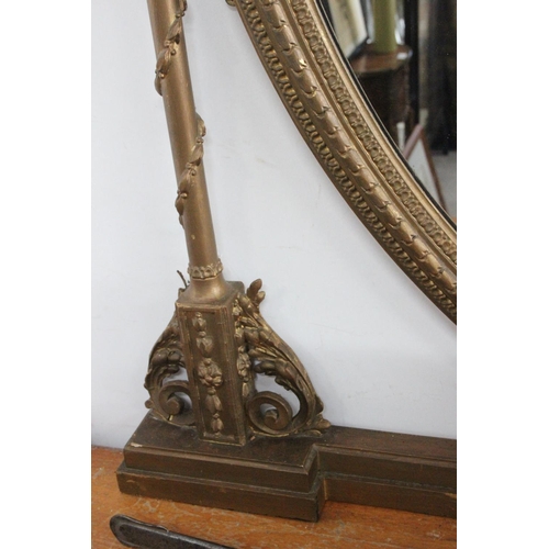 207 - A stunning antique/ Georgian gilt framed oval over mantle mirror, with twin pillars & ornate carving... 