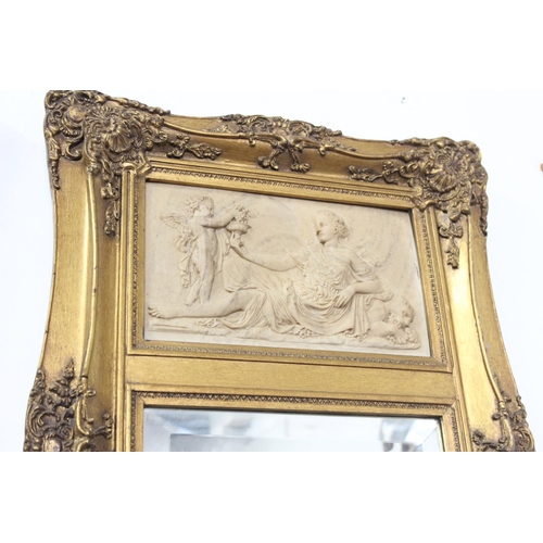 215 - A pair of large gilt framed mirrors with inset carved panels, bevelled glass & seals to rear. Each m... 