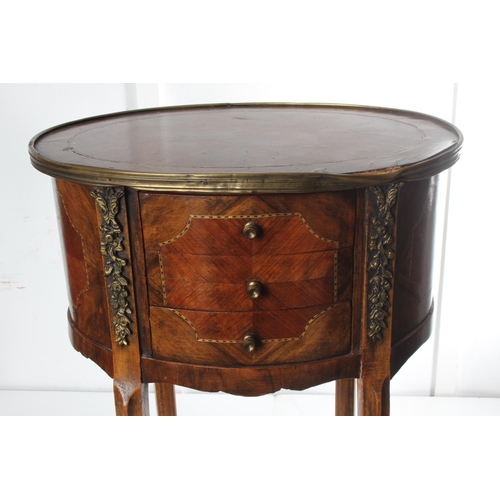 217 - An antique style oval shaped occasional table with drawer & inlaid detail.