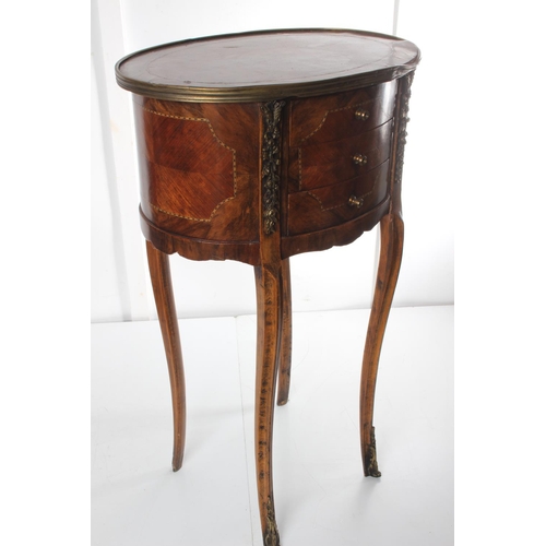 217 - An antique style oval shaped occasional table with drawer & inlaid detail.