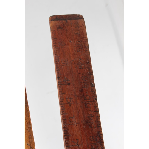 219 - An antique wood & brass surveyors measuring stick.