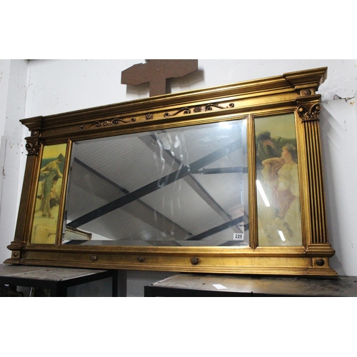 220 - A large antique style over mantle mirror with carved frame, bevelled glass mirror & decorative panel... 