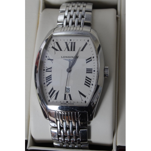 225 - A stunning Gents Longines dress watch in Stainless Steel case with date window, complete in original... 