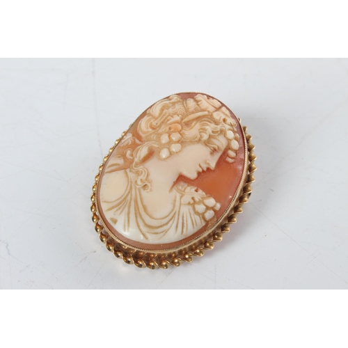 228 - A stunning cameo brooch in 9ct gold mount.