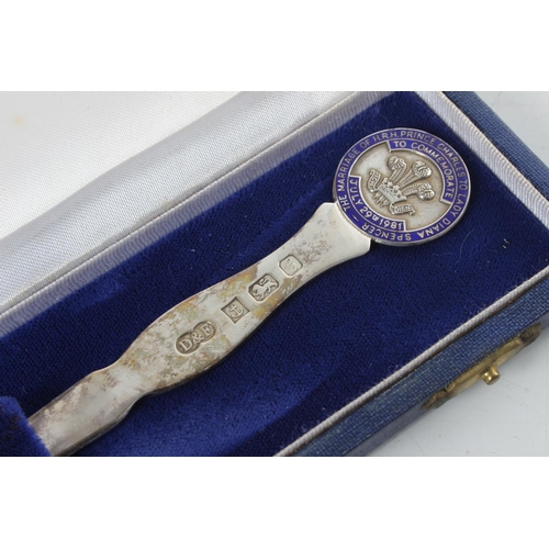 231 - A commemorative Sterling Silver letter opener, produced to celebrate Charles & Dianas wedding, in bo... 