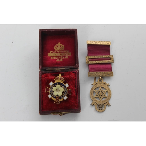 237 - A gilt silver Masonic Jewel/ medal & Primrose league badge in original box.