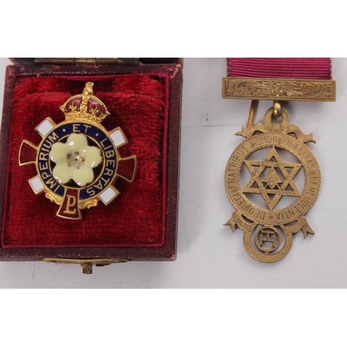 237 - A gilt silver Masonic Jewel/ medal & Primrose league badge in original box.