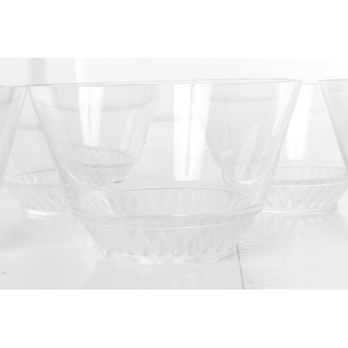 246 - A stunning set of 7 antique Rene Lalique crystal pudding bowls.