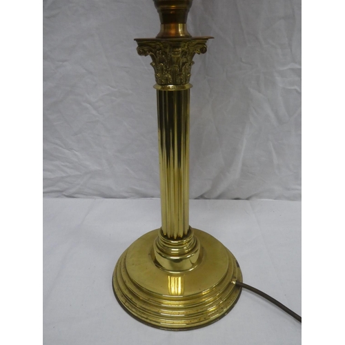 311 - A reproduction oil lamp table lamp, with brass Corinthian pillar base, ruby glass font & decorative ... 