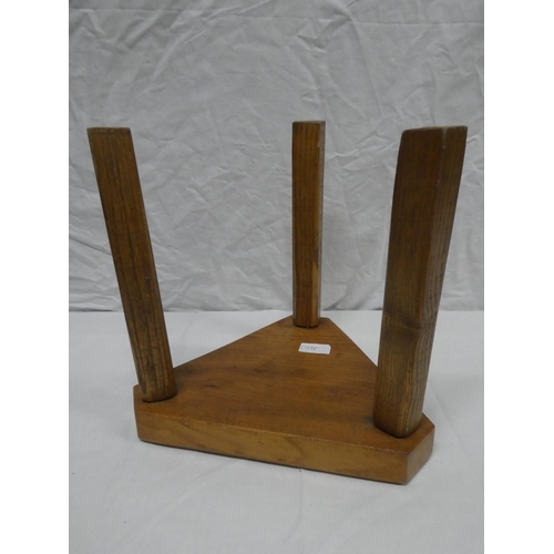 312 - A handmade wooden 3 legged stool with 'Dartmoor' to seat. measuring 12.5x12x11inches.