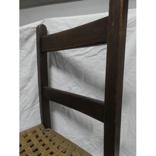 313 - An antique Irish vernacular Sugan chair.