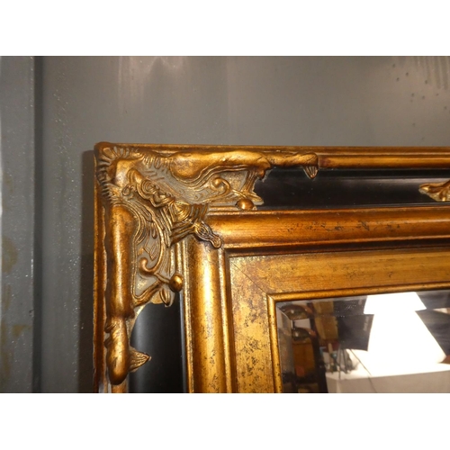 328 - A stunning & large antique style mirror, with decorative frame & bevelled glass. Measures 36x72inche... 