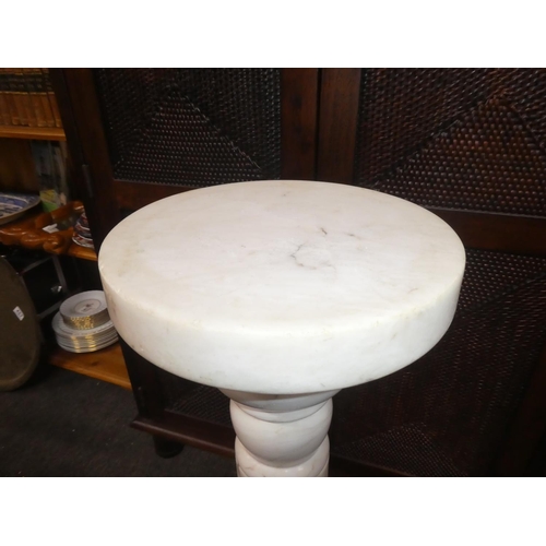 329 - A white marble pedestal, mesauring 32inches.