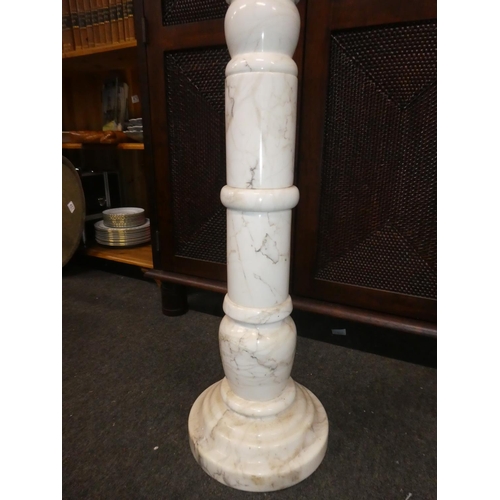 329 - A white marble pedestal, mesauring 32inches.