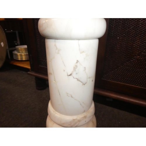 329 - A white marble pedestal, mesauring 32inches.