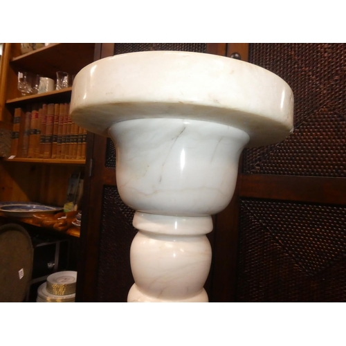 329 - A white marble pedestal, mesauring 32inches.