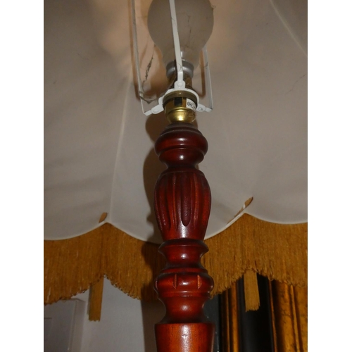 330 - A vintage standard lamp with shade.