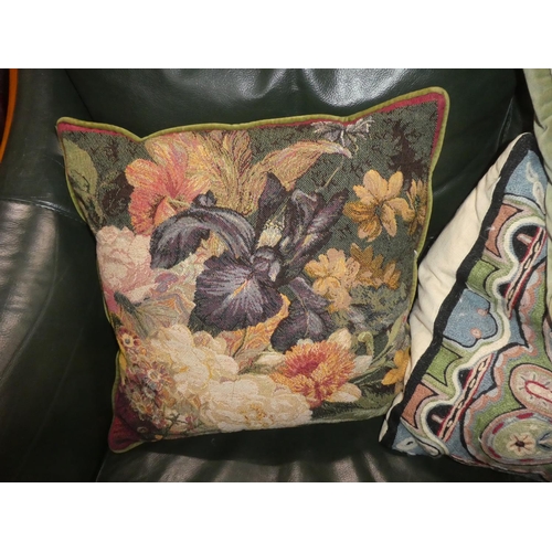 334 - A large assortment of various cushions.