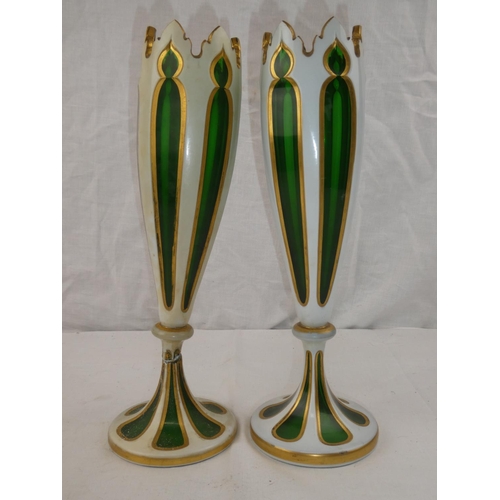 354 - A pair of decorative antique green & white glass vases with decorative gilt detail (1 a/f)