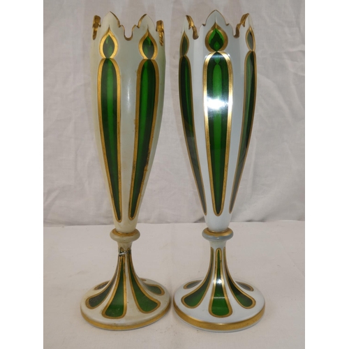 354 - A pair of decorative antique green & white glass vases with decorative gilt detail (1 a/f)