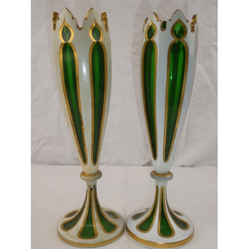 354 - A pair of decorative antique green & white glass vases with decorative gilt detail (1 a/f)