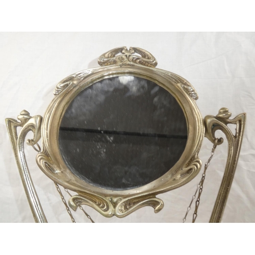 356 - A decorative antique/ Art Nouveau style dressing table mirror, with swinging figure.