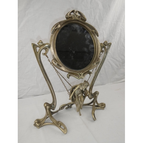 356 - A decorative antique/ Art Nouveau style dressing table mirror, with swinging figure.