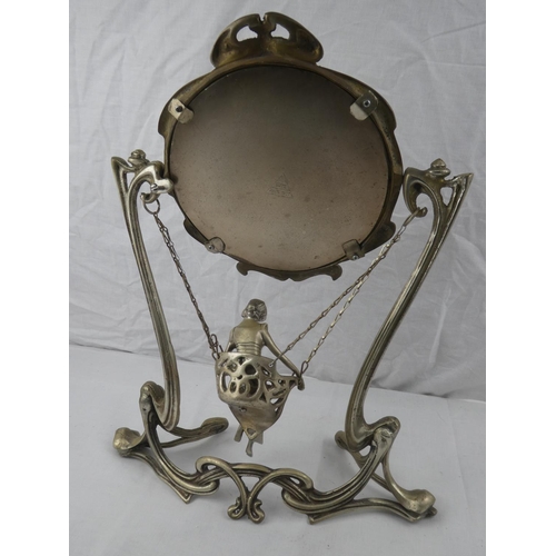 356 - A decorative antique/ Art Nouveau style dressing table mirror, with swinging figure.