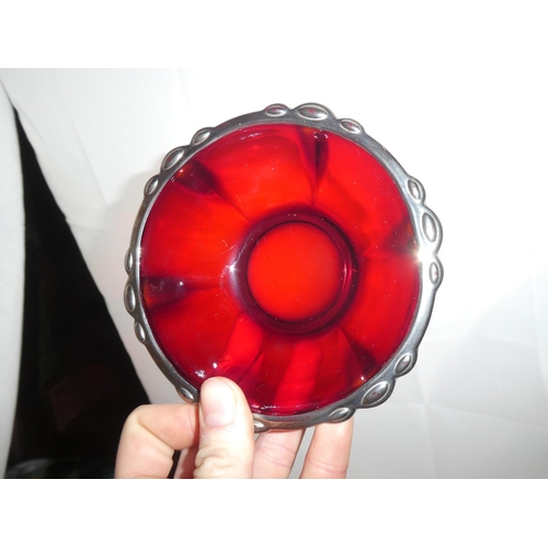 357 - A set of 6 red glass pudding bowls, plates & spoons.