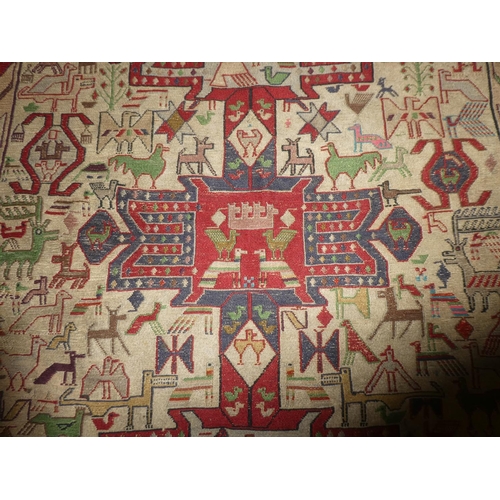 363 - A handwoven Iranian rug, decorated with various animals. Measuring 4ft x 5ft.