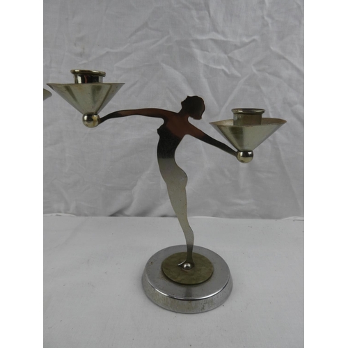 368 - A stunning pair of antique/ Art Deco English Chromium silhouette figure candlesticks. Measuring appr... 