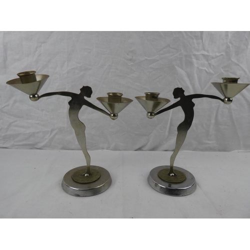 368 - A stunning pair of antique/ Art Deco English Chromium silhouette figure candlesticks. Measuring appr... 